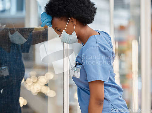 Image of Surgeon, mental health pain and black woman sad after medicine fail, hospital crisis or nurse mistake. Face mask, burnout fatigue or African female doctor tired after medical risk, anxiety or service