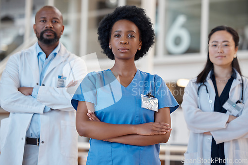 Image of Serious black woman, portrait and doctors for teamwork, healthcare leadership and hospital management. Diversity group, medical employees and arms crossed for collaboration, trust and surgery support