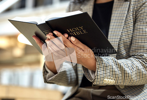 Image of Hands, bible and person with reading, religion and faith with knowledge, learning and studying God. Priest, book and focus for spiritual wisdom, information and mindset for Christianity with peace