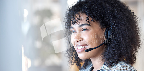 Image of Call center, smile and woman in office consulting in crm, telemarketing or customer service. Happy, face and lady consultant working in contact us, online support or help, advice or virtual assistant