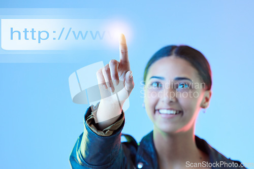 Image of Hologram, futuristic and woman typing, link and connection against a blue studio background. Female person, employee or holographic with data analytics, cloud computing or programming with url or web