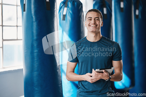 Image of Fitness, man and gym coach with tablet ready for exercise class and training with a smile. Young male person, athlete and wellness center for personal trainer happy from workout with digital app