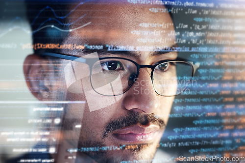 Image of Man, face and programmer coding at night with overlay or dashboard of code, malware or software at office. Male person, coder or developer working late in problem solving, algorithm or programming