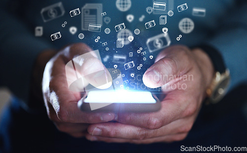 Image of Businessman, hands and phone with money icons at night for stock market, trading or financial freedom at office. Closeup of man on mobile smartphone display in online banking app, investment or media