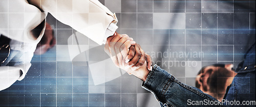 Image of Business people, handshake and meeting in partnership, trust or teamwork for unity below at office. Low angle of employees shaking hands for introduction or greeting in agreement or deal at workplace