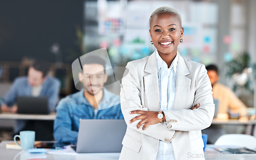 Image of Portrait, accountant and black woman with arms crossed in office, business workplace or coworking company. Face, confidence or happy professional, African entrepreneur and auditor, employee or worker