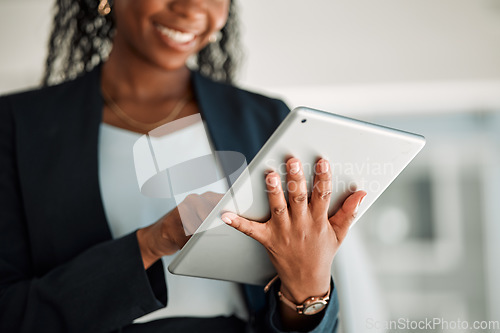 Image of Lawyer, hands and black woman with tablet in office for legal research, online app and social media. African attorney, technology and happy professional reading business email, networking or internet