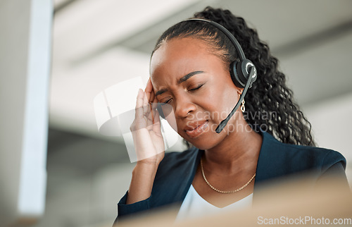 Image of Call center stress, anxiety or black woman with headache pain due to burnout fatigue in a telecom office. Migraine, failure crisis or tired consultant depressed or frustrated by crm or sales deadline