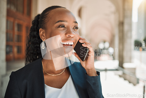 Image of Happy, talking and a black woman on a phone call, thinking and in communication in the city. Smile, idea and an African girl or employee speaking on a mobile for a chat, conversation or discussion