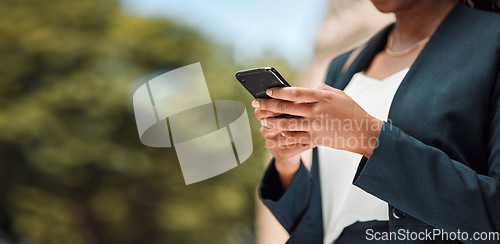 Image of Woman, hands and phone in city for communication, social media or networking outdoors. Closeup of female person chatting, texting or typing on mobile smartphone app for online browsing in urban town