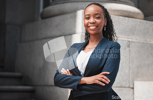 Image of Arms crossed, lawyer or portrait of happy black woman with smile or confidence working in a law firm. Confidence, empowerment or proud African attorney with leadership or vision for legal agency