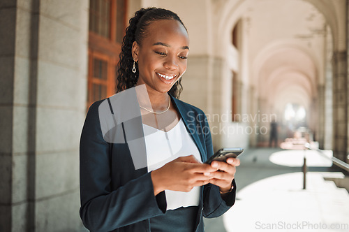 Image of Phone, travel and a business black woman in the city, searching for directions or typing a message. Mobile, commute and map with a young female employee looking for a location on a navigation app