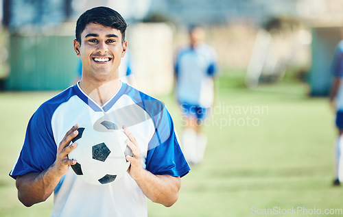 Image of Football player, portrait and man on field for training, fitness and workout goals, competition and exercise. Happy soccer athlete or face of young person with sports mindset, game and outdoor health