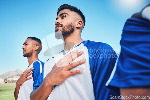 Image of National anthem, soccer team and listening at stadium before competition, game or match. Football, song or sports players together for pride, collaboration or serious for contest, exercise or workout