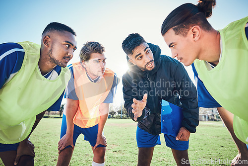 Image of Soccer player, team talk and coach on field for tactics, sport and listen together for training, advice or fitness. Athlete men, group and mentor on pitch for exercise, football or teamwork in summer