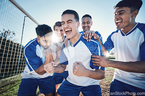 Image of Winning, goal and soccer player with team and happiness, men play game with sports and celebration on field. Energy, action and competition with male athlete group, cheers and diversity with success