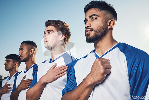 Image of National anthem, football team and listening before competition, game or match. Soccer, song and sports players together with pride, group collaboration and serious for contest, exercise or workout