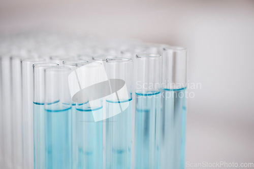 Image of Test tube, blue chemical and closeup, chemistry and science study in lab, sample and medical research. Pharmaceutical, biotechnology and scientific experiment, glass container with liquid solution