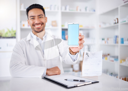 Image of Happy man, portrait and pharmacist with phone screen in pharmacy, drugstore or shop. Face, smartphone and medical professional with mockup space for healthcare promotion, advertising and marketing.