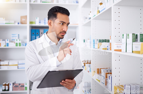 Image of Pharmacist, medicine and man with checklist for stock in pharmacy store. Pills, inventory and medical doctor with clipboard to count pharmaceutical drugs, supplements and medication for healthcare.