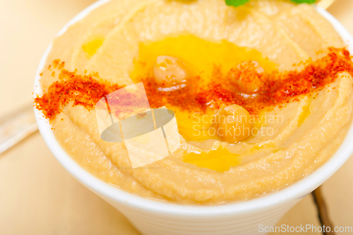 Image of Hummus with mint on top