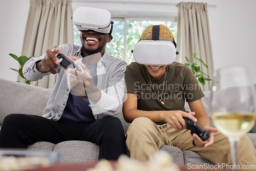 Image of Virtual reality, funny couple and gaming on sofa in home living room, happy and laughing together. Vr, couch and African man and woman play 3d game, metaverse and esports with futuristic technology.