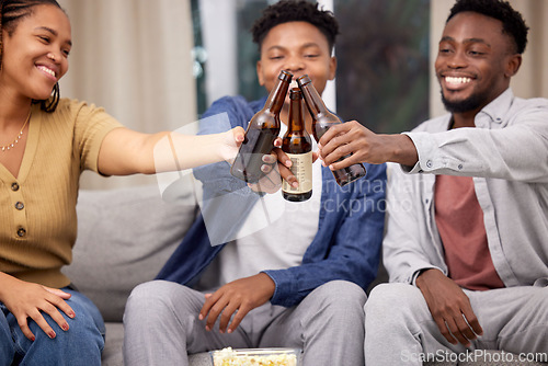 Image of Black people, friends and beer in cheers on sofa for celebration, friendship or social gathering at home. Happy African group in relax, toast or enjoying alcohol, memory or event for entertainment