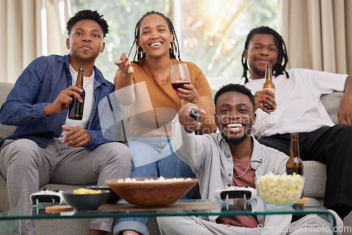 Image of Relax, television and friends on a sofa with beer and popcorn for movie, film or streaming in their home. Group of people, watching tv and smile in living room together with entertainment on weekend