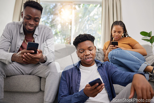 Image of Phone, communication and african friends on social media for browsing while sitting on a living room sofa. App, contact and internet with a group of black people using mobile technology in a home
