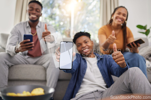 Image of Black people, friends and phone mockup with thumbs up for approval in relax together at home. Happy African group smile and show mobile smartphone app display, like emoji or yes sign for social media