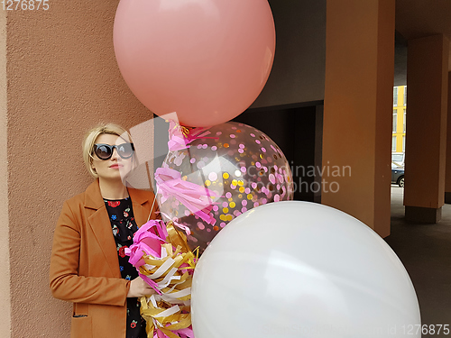 Image of Young fashion happy blonde woman with baloons ,fashion photo, instagram filter