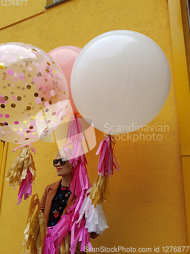 Image of Young fashion happy blonde woman with baloons ,fashion photo, instagram filter