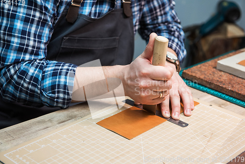 Image of Concept of handmade craft production of leather goods.