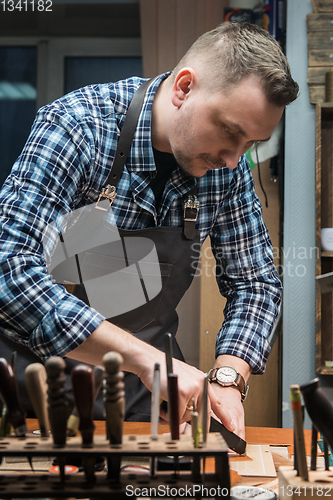 Image of Concept of handmade craft production of leather goods.