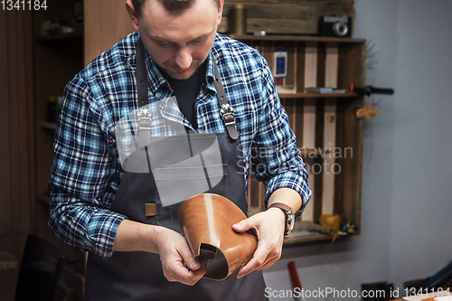 Image of Concept of handmade craft production of leather goods.