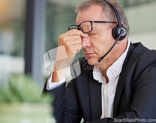 Image of Call center, headache and business man stress, health problem or fatigue for communication or finance fail. Agent, consultant or sales person with eye pain, tired and online or financial mistake