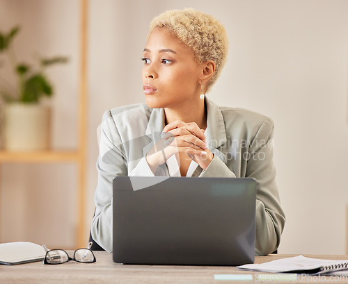 Image of Thinking, serious and a woman with a laptop in an office for ideas, inspiration and business vision. Focus, desk and a corporate employee with plan for an email, web research or work on a computer