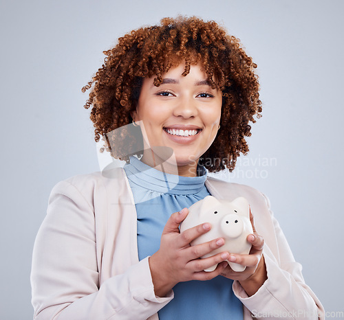 Image of Portrait, piggy bank and happy woman in studio for savings, growth and budget on white background. Money, box and face of female person with investment success, smile and future financial freedom