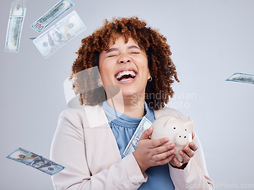 Image of Happy woman with money rain, piggy bank and savings in studio, finance and budget with dollar investment. Happiness, growth and cash profit, salary bonus for girl with money box on white background.