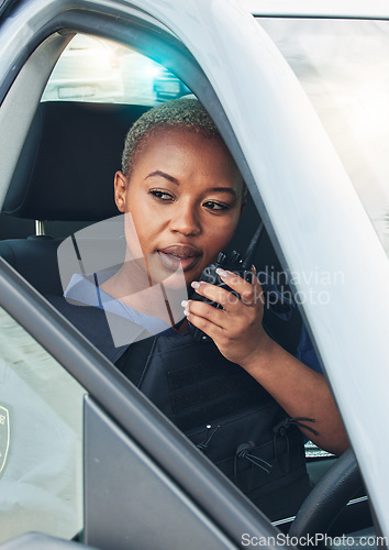 Image of Police woman, car and radio for talking, crime investigation or patrol with thinking in city. African law enforcement officer, driving and call backup on street for lead, problem solving or justice