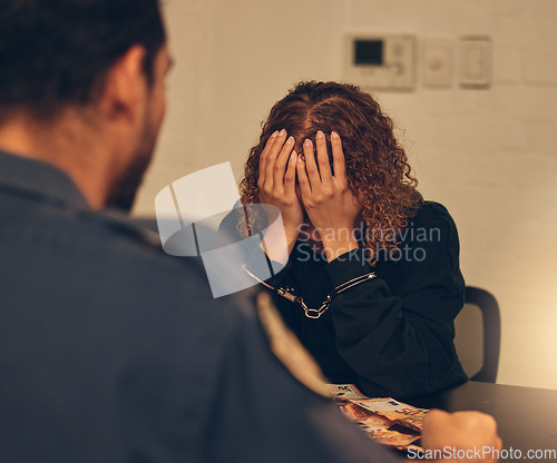 Image of Police, investigation and detective listening to woman for crime interrogation or criminal arrest. Law, crime and man at station for corruption interview, questions in money laundering and handcuffs.