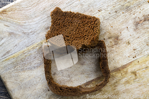 Image of chunks of dark black bread