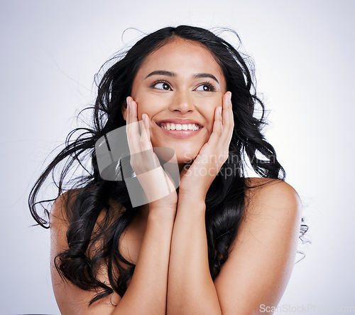 Image of Woman, hair and beauty, touching face with smile and balayage hairstyle with cosmetics on white background. Young, female model and cosmetology with haircare, salon treatment and happy in a studio