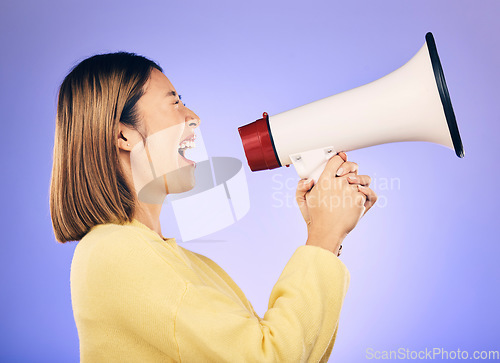 Image of Megaphone, voice and young woman with human rights, equality and freedom of speech or strong opinion. Person protest, call to action and change or justice with noise on studio or purple background
