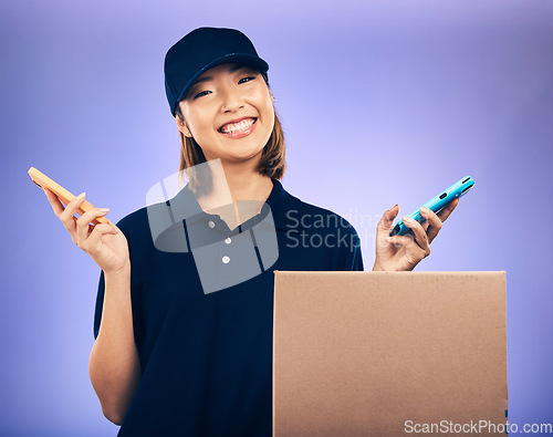 Image of Courier, box and phone in studio portrait with smile, communication and e commerce by purple background. Happy Japanese woman, smartphone and package with delivery app, supply chain and logistics