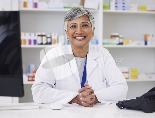 Image of Portrait, pharmacist and smile with professional for happiness at chemist for medicine or help. Mature female, pharmacy and face with smile for medicine with customer service in retail healthcare.