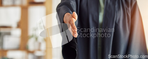 Image of Judge, handshake and lawyer in thank you for greeting, meeting or partnership at attorney office. Person, graduate or jury shaking hands for introduction, deal or agreement in legal law at workplace