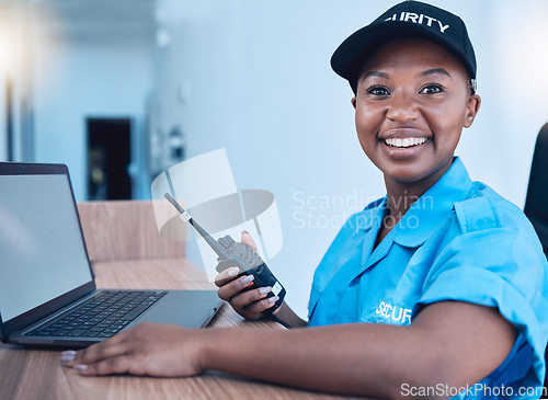 Image of Security guard, communication and officer with smile use walkie talkie or radio for an emergency or criminal. Protection, safety and black woman talking in a law enforcement service office for crime