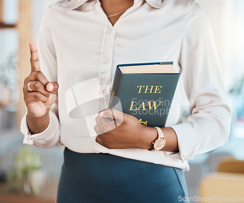 Image of Legal, lawyer and book with hands of black woman in office for advocate, justice and consultant. Attorney, advisor and study with closeup of person in law firm for knowledge, expert and government