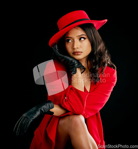 Image of Woman, retro red fashion and glamour in studio with vintage beauty and wealth. Young female person, black background and luxury style with cosmetics, designer rich clothes and model with confidence